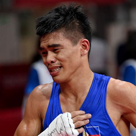 Filipino boxer Carlo Paalam gets shot at Olympic gold after win over.